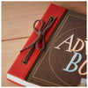 Above - DIN A4 adventure book in the style of a replica